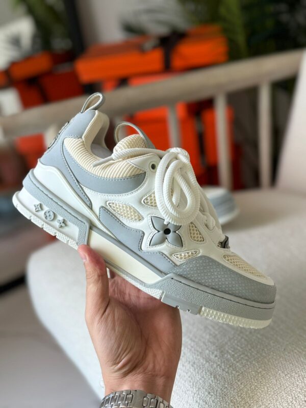 Louis Vuitton White & Grey Flower Trainer – Now at Tajstorz Dubai
