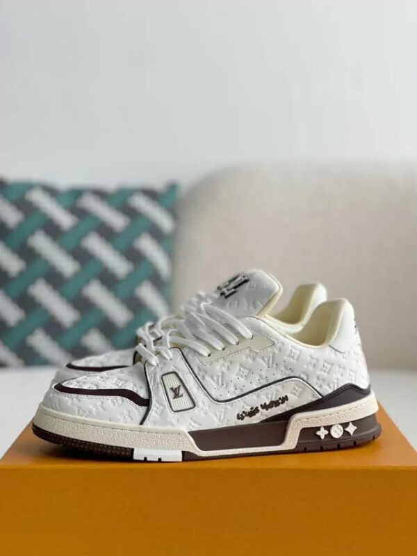 Step Into Clean Luxury: Louis Vuitton White Trainer with Brown Accents  