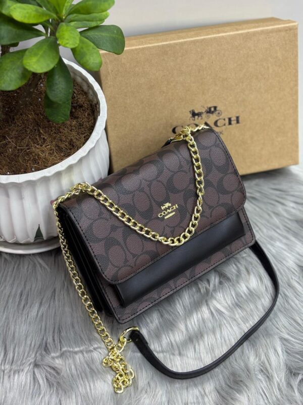 Coach Mini Klare Crossbody in Signature Canvas in Dubai