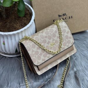 Coach Mini Klare Crossbody in Signature Canvas in Dubai