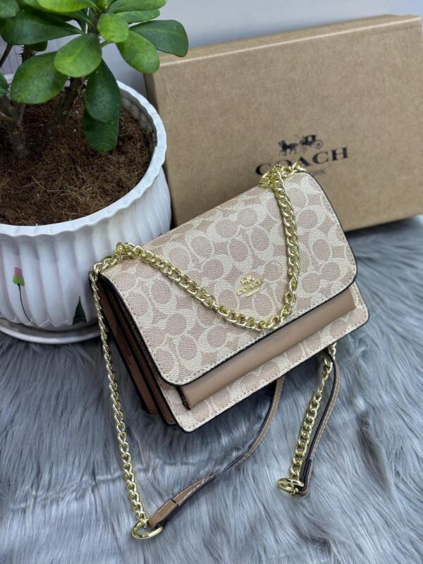 Coach Mini Klare Crossbody in Signature Canvas in Dubai